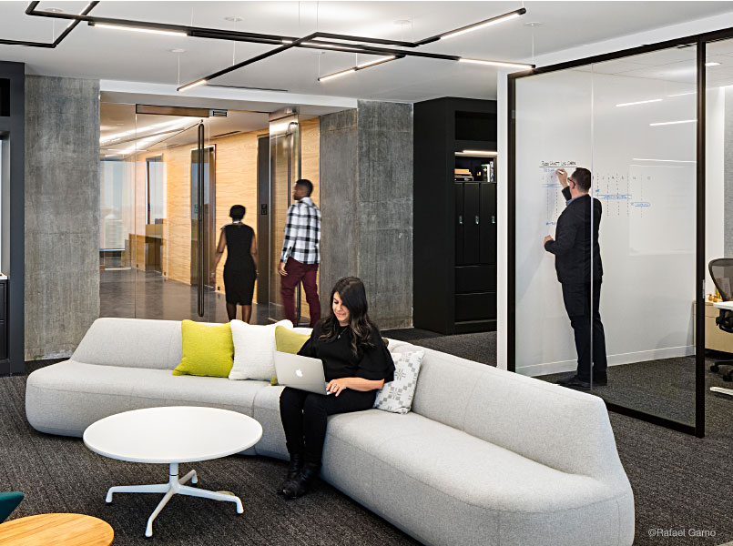 Office break area and conference room with light sensors in walls