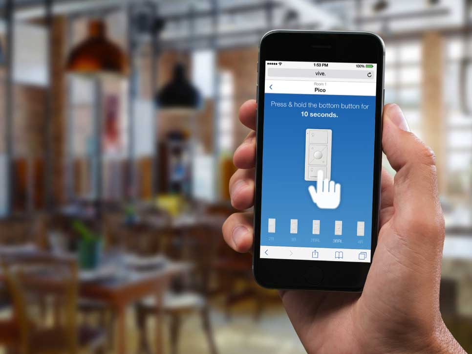 Vive wireless lighting control system app on a person's cellphone