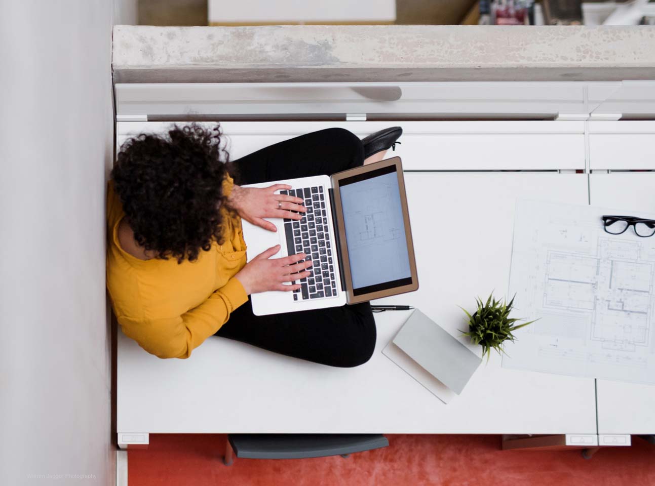 view from above of a woman on laptop