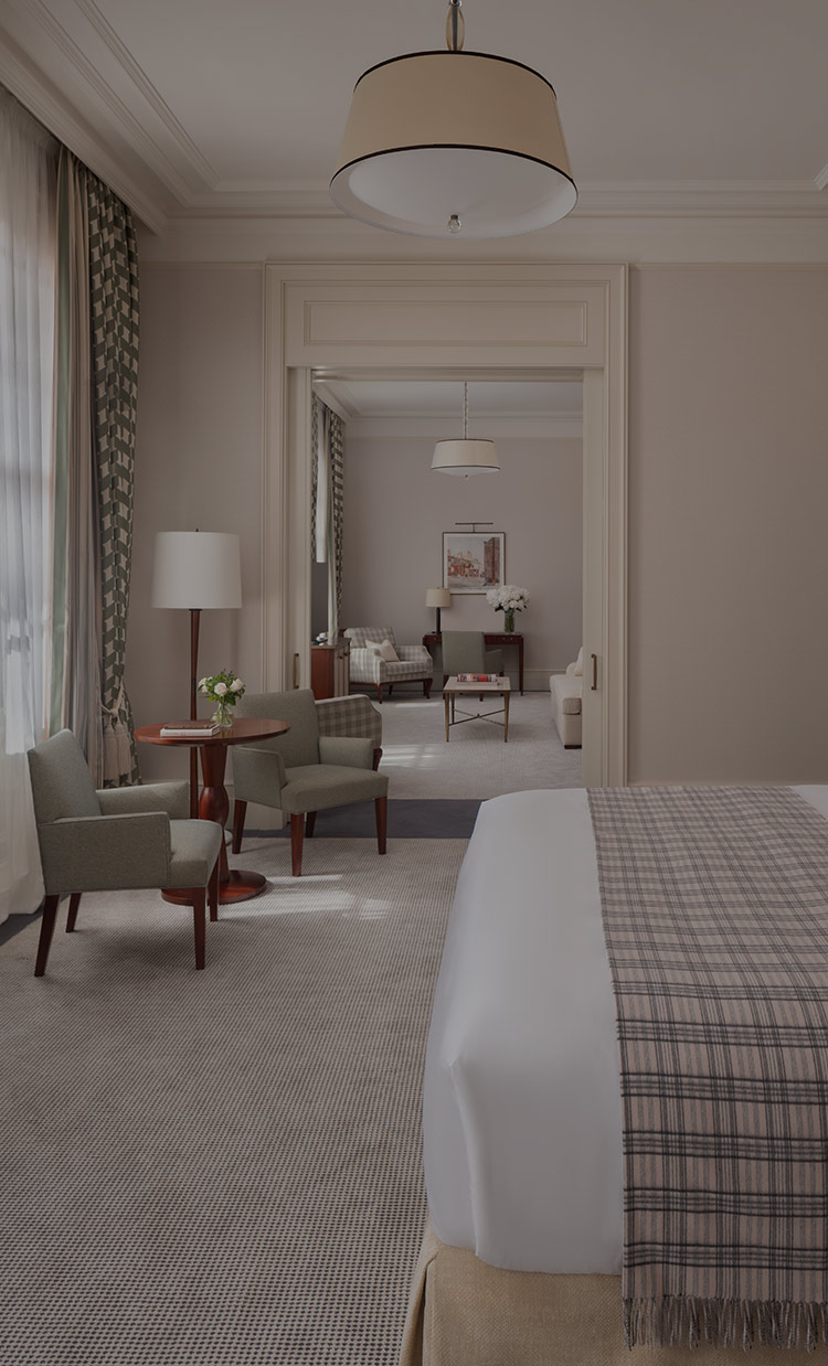 A classic designed hotel room, controlled by Lutron's myRoom XC guestroom management solution