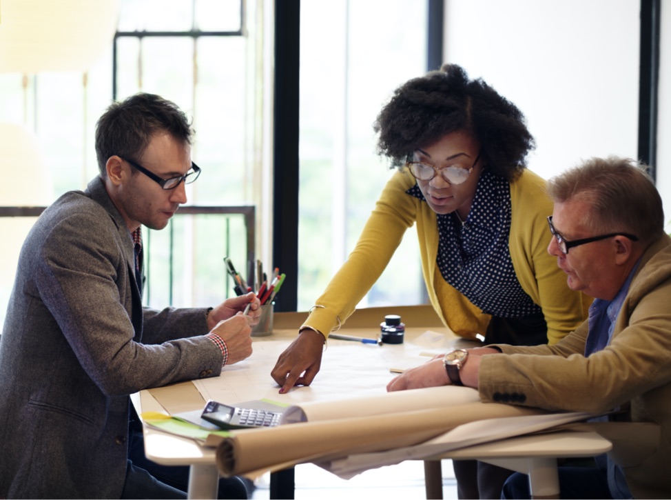 service technician meeting with architects