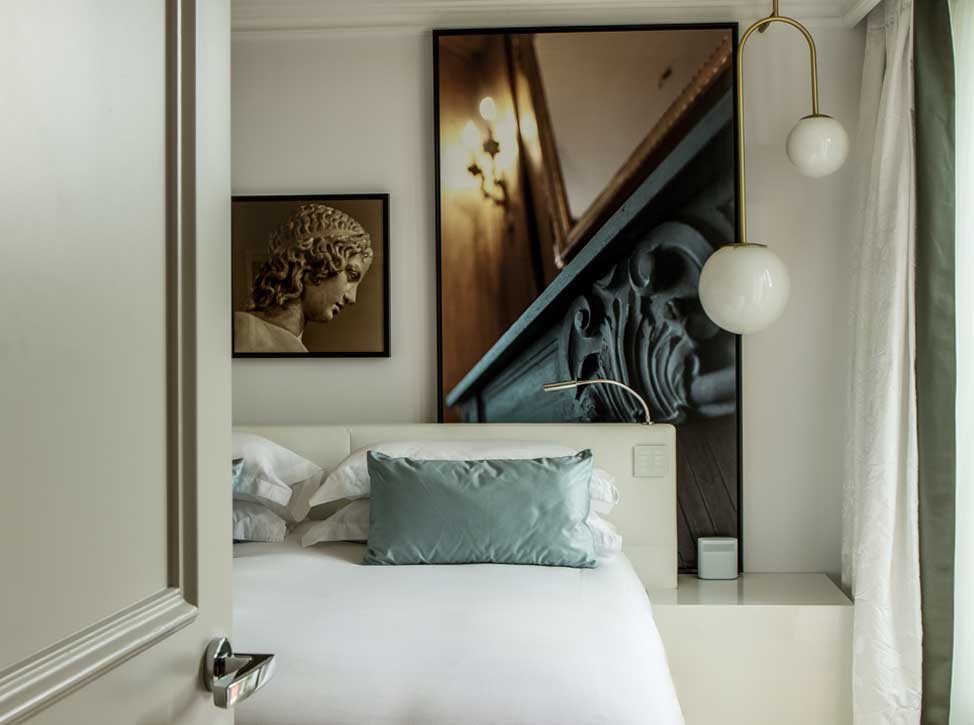 Luxury hotel guestroom with Lutron myRoom lighting control